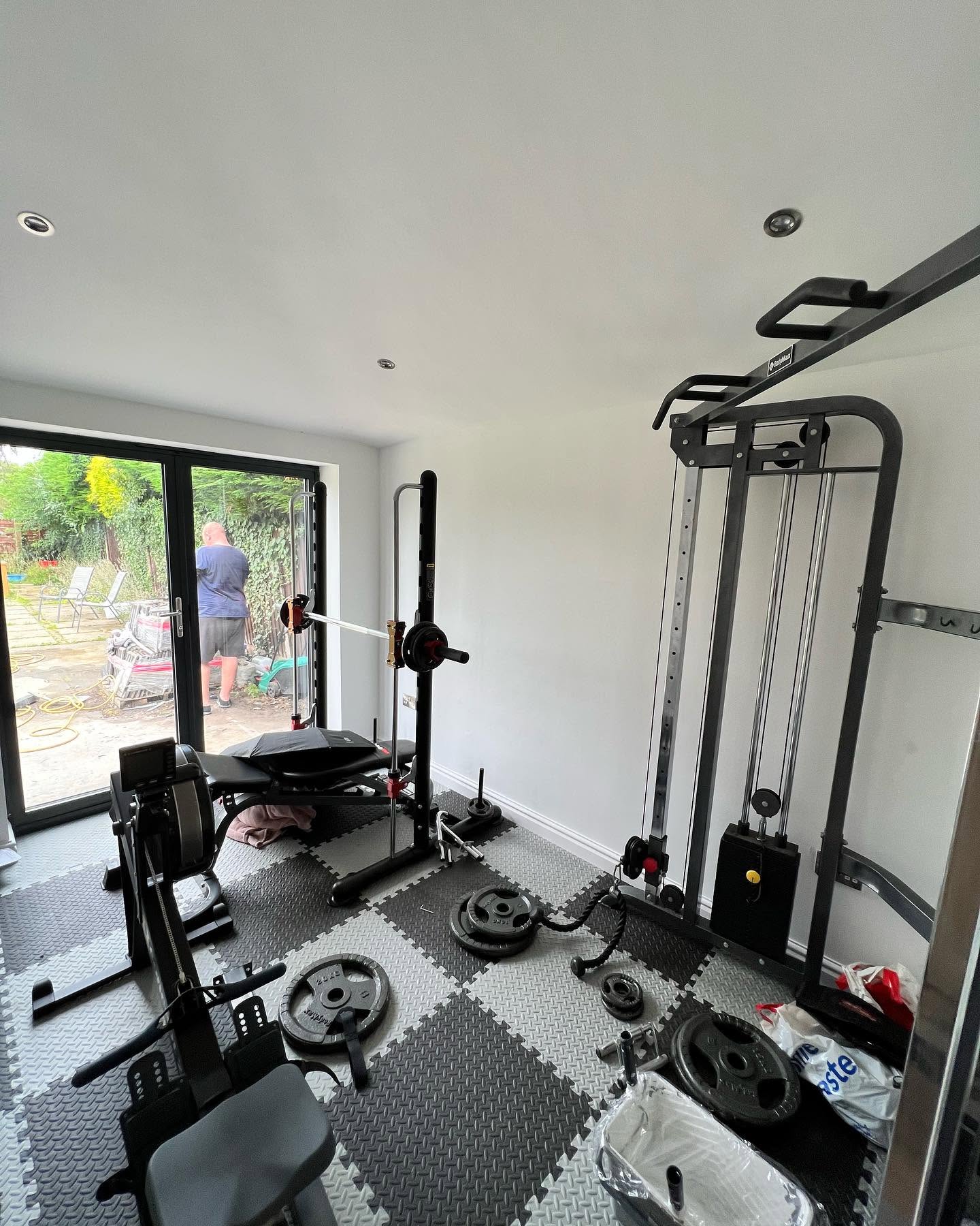 Garden room fitted out as a home gym with bifold doors, by Ultra Build Northwest