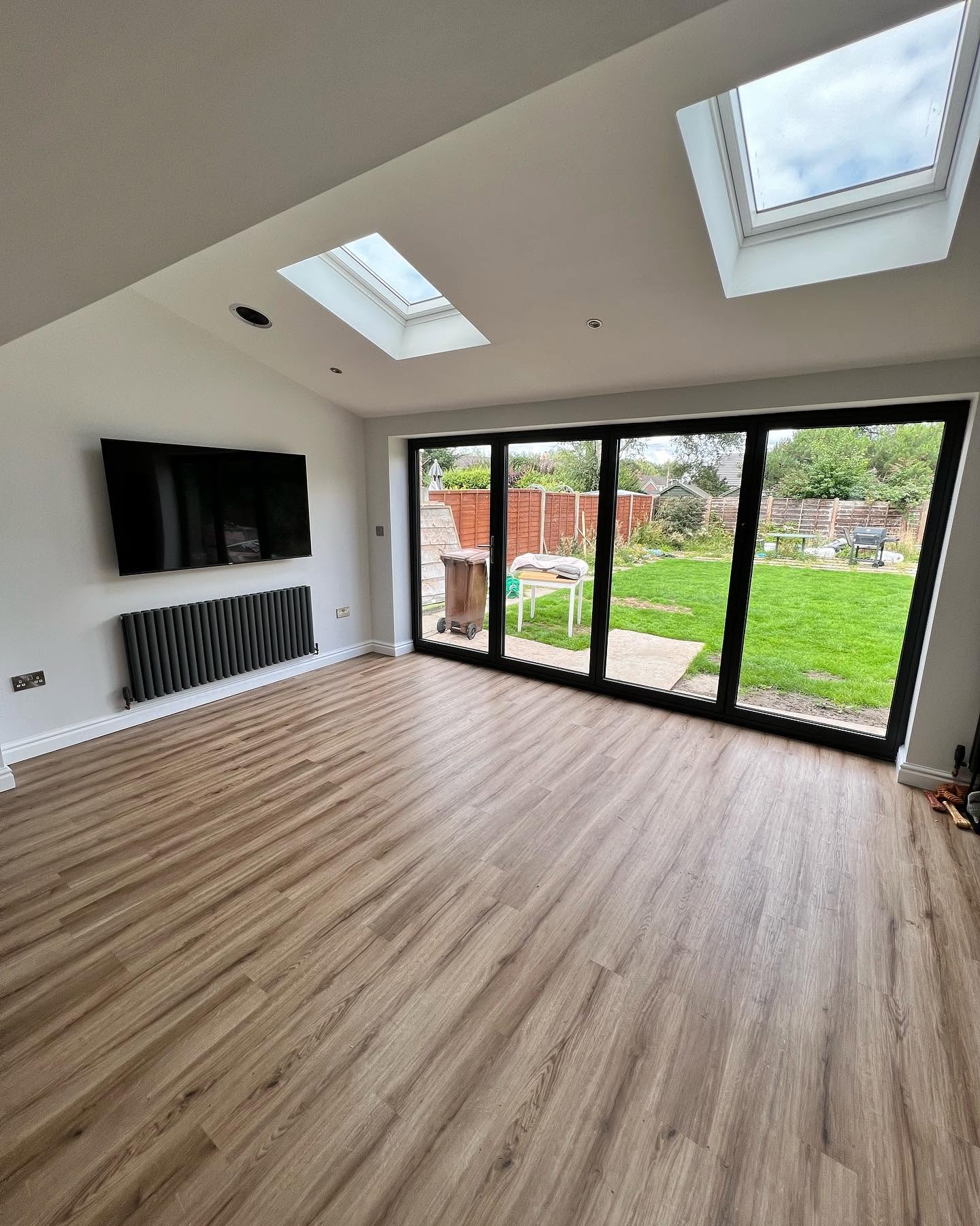 Open-plan living area extension with bifold doors onto the garden